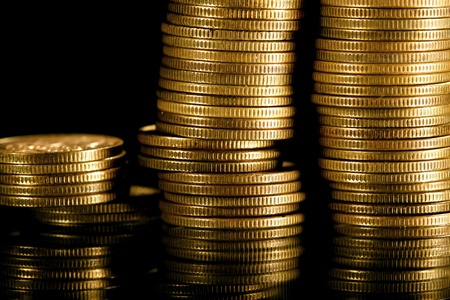 golden coins on black background