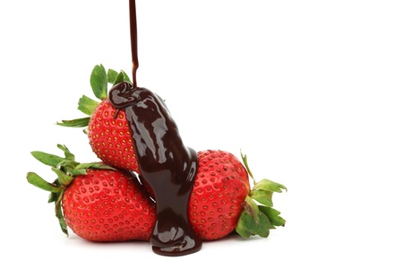 strawberry in chocolate  isolated on whiteの写真素材
