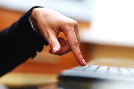 woman hands working on keyboard