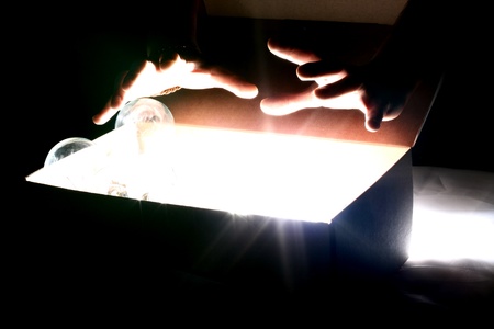 hand steal ideas lamps from box の写真素材