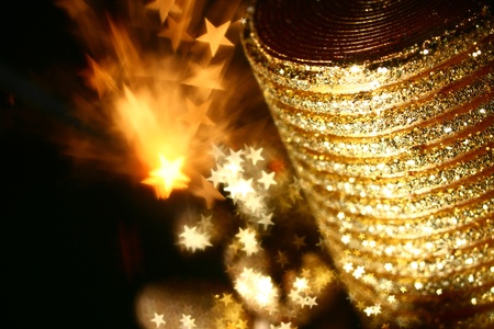 golden stars holiday background macro close up