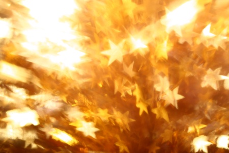 golden stars holiday background macro close up