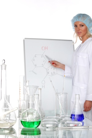 Woman  conducting a chemical experimentの写真素材