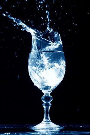 alcohol splash on black  backgroundの写真素材