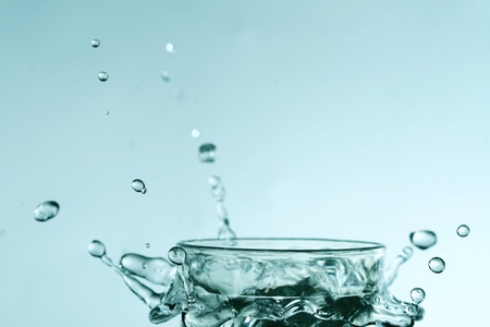 super splash in glass on white backgroundの写真素材