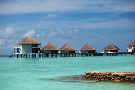 resort maldivian houses in blue seaの写真素材