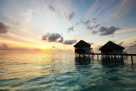 resort maldivian houses on sunriseのeditorial素材