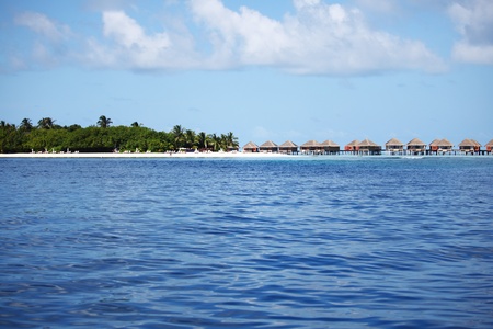 tropical island in blue seaの写真素材