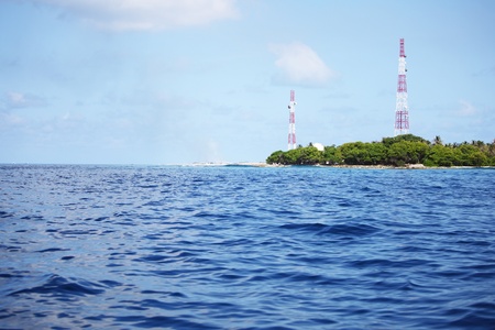 tropical island in blue sea