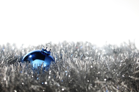 blue christmas ball on silver backgroundの写真素材