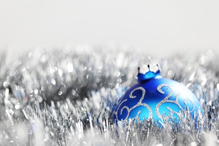 blue christmas ball on silver backgroundの写真素材