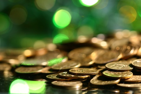 coins and colored  bokeh on backgroundの写真素材