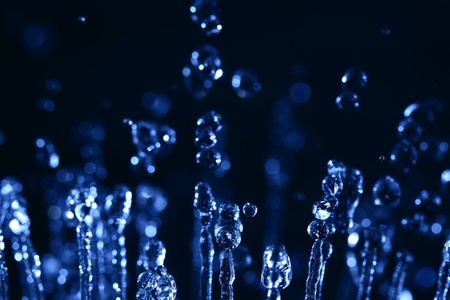 water drops in motion macro close upの写真素材