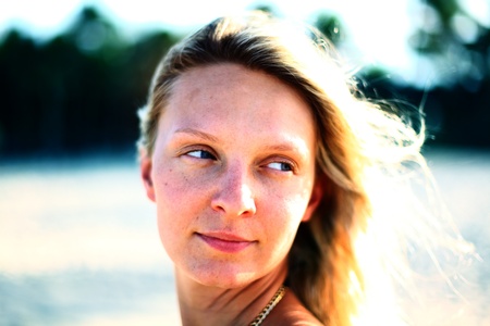 girl portrait close up ocean on backgroundの写真素材