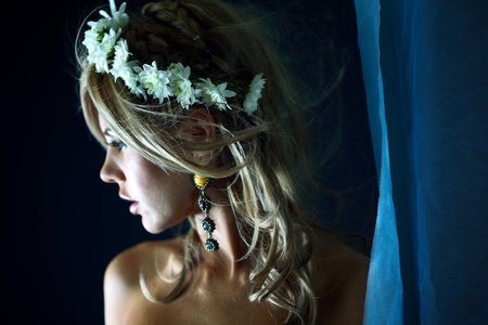 young women on black flowers in hairの写真素材