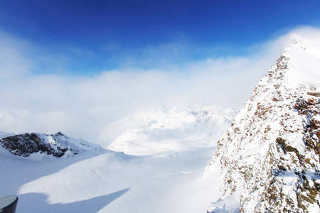 top of alps in sky
