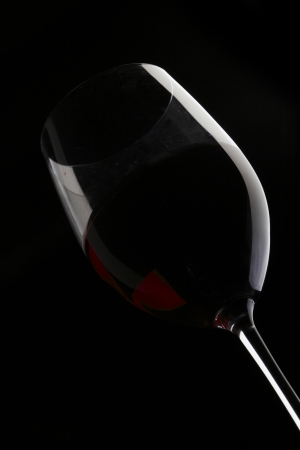 Red Wine Glass silhouette Black Backgroundの写真素材