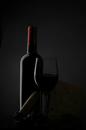 Red Wine Glass silhouette Black Backgroundの写真素材