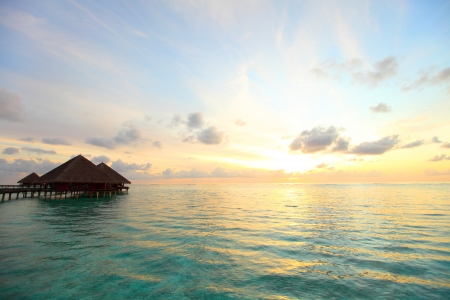 resort maldivian houses on sunriseのeditorial素材