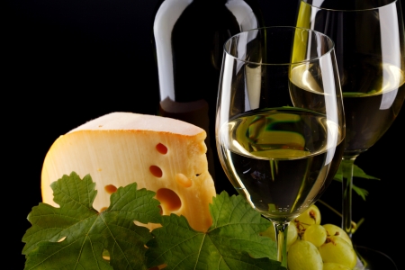 white wine and cheese on blackの写真素材
