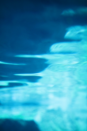 Abstract water surface with blue reflectionの写真素材