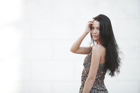 Portrait of a beautiful girl on the streetの写真素材