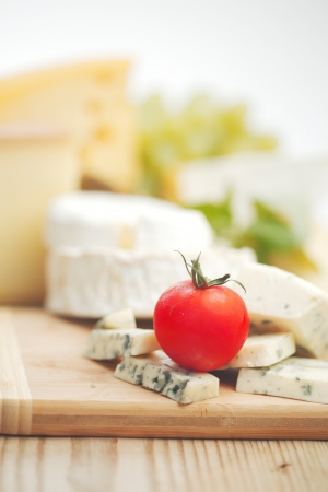 cheese on a wooden tableの写真素材