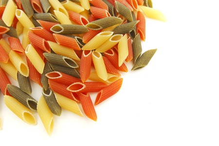 Colored pasta isolated on white backgroundの写真素材