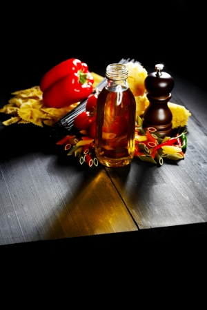 Pasta ingredients on black table, italian cuisine conceptの写真素材