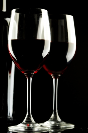 Red Wine Glass silhouette Black Backgroundの写真素材