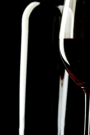 Red Wine Glass silhouette Black Backgroundの写真素材
