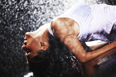 sexy woman in water studioの写真素材