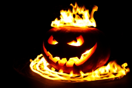 Burning halloween pumpkin の写真素材