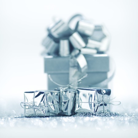 Holiday gifts on glitter shiny backgroundの写真素材
