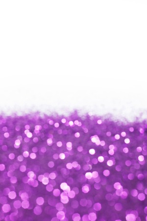 Purple shiny glitter holiday background with white copy spaceの写真素材
