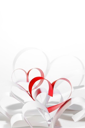 Valentines day card with paper and ribbon hearts on whiteの写真素材