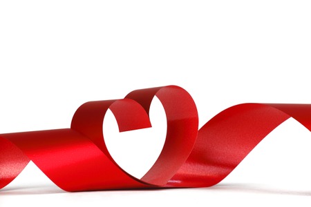 Ribbons shaped as hearts on white, valentines day conceptの写真素材