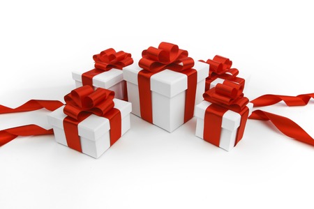 Gift boxes with red bow isolated on white backgroundの写真素材