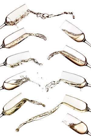 Champagne splash in glass set isolated on white backgroundの写真素材