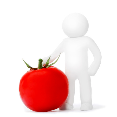 Plasticine man with tomato isolated on white backgroundの写真素材