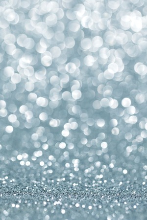 Abstract silver shiny glitter bokeh christmas backgroundの写真素材