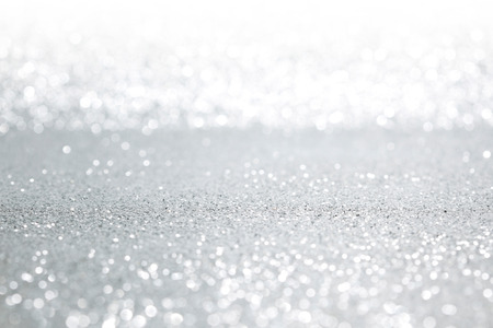 Shiny abstract silver defocused glitter backgroundの写真素材