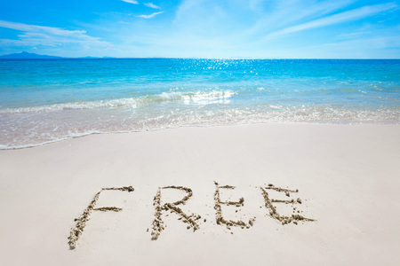 Free text on white sandy beach and seaの写真素材