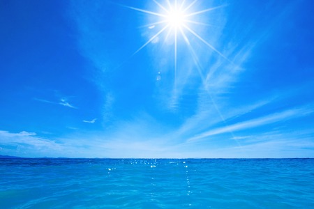 Beautiful tropical sea horizon and sky with sunの写真素材