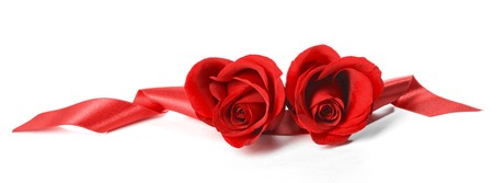 Two heart shaped red roses and ribbons isolated on white background, Valentines dayの写真素材