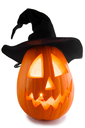 Jack O Lantern Halloween pumpkin with witches hat isolated on white backgroundの写真素材