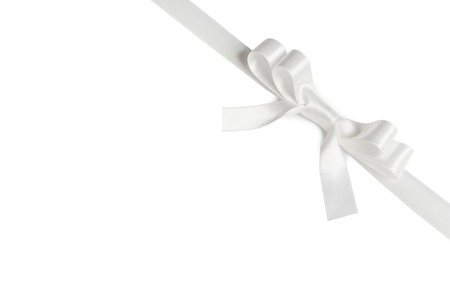Shiny white satin ribbon and bow isolated on white background. Holiday gift conceptの写真素材