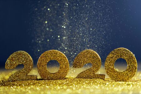2020 New Year luxury design concept. Golden 2020 New Year horizontal template with golden glitter on blue backgoundの写真素材