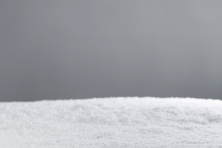 White snow on gray background, Christmas winter design elementの写真素材