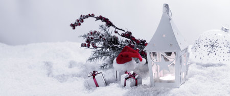 Christmas holidays card with gifts , balls , and white glowing lantern in snow